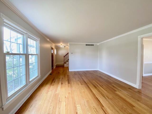 2929 Waco Rd, Lexington, KY 40503 - empty room featuring light wood-style floors, ornamental molding, and stairs