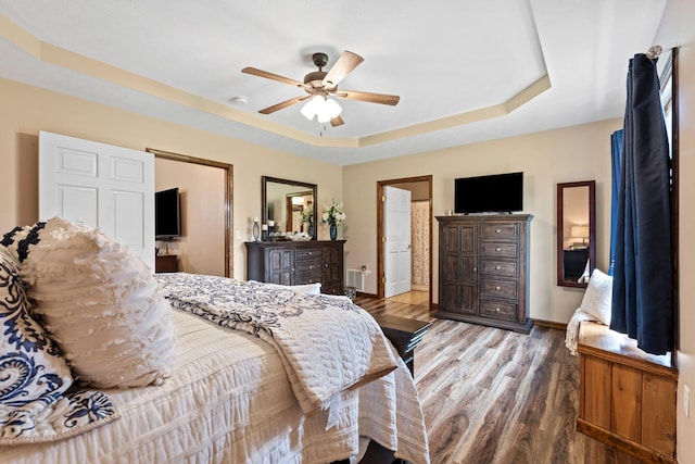 200 Maxwell Ln, Somerset, KY 42503 - bedroom featuring a raised ceiling, wood finished floors, and ceiling fan