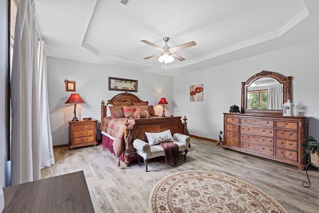 200 Maxwell Ln, Somerset, KY 42503 - bedroom with a raised ceiling, wood finished floors, and ceiling fan