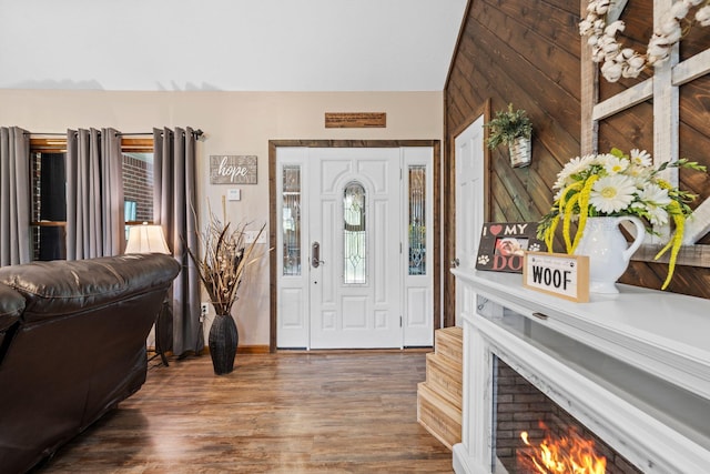 200 Maxwell Ln, Somerset, KY 42503 - foyer featuring wood finished floors and a warm lit fireplace