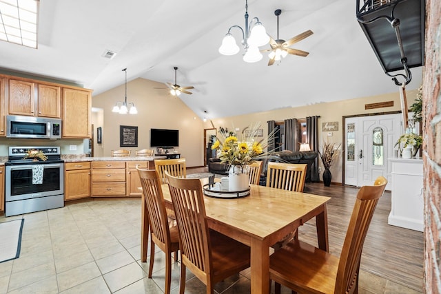 200 Maxwell Ln, Somerset, KY 42503 - dining room with a chandelier, a ceiling fan, light tile patterned floors, and high vaulted ceiling
