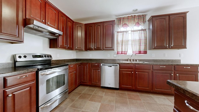 705 Dawson Springs Way, Lexington, KY 40511 - kitchen featuring stainless steel appliances, under cabinet range hood, and dark stone countertops