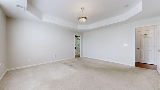 705 Dawson Springs Way, Lexington, KY 40511 - spare room featuring a raised ceiling and carpet flooring