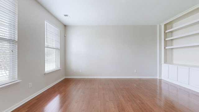 705 Dawson Springs Way, Lexington, KY 40511 - spare room with wood finished floors and built in shelves
