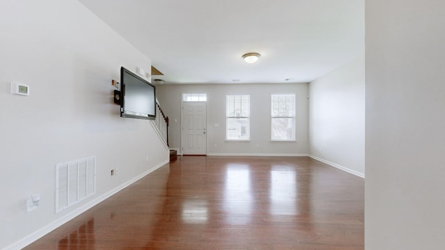 705 Dawson Springs Way, Lexington, KY 40511 - spare room featuring wood finished floors and stairs