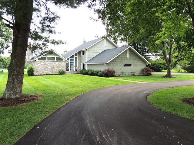 13 Scotland Dr, Frankfort, KY 40601 - view of front of house with a front lawn, stone siding, and asphalt driveway