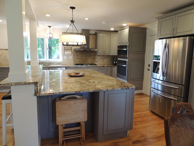 13 Scotland Dr, Frankfort, KY 40601 - kitchen featuring appliances with stainless steel finishes, wall chimney exhaust hood, gray cabinetry, tasteful backsplash, and recessed lighting