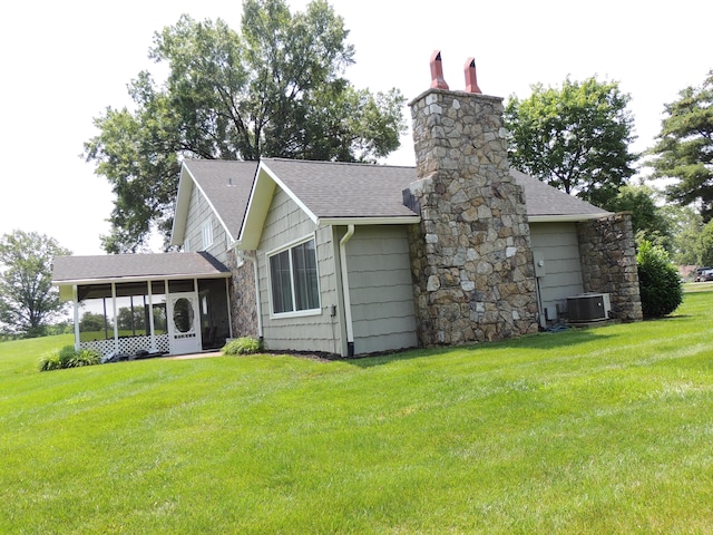 13 Scotland Dr, Frankfort, KY 40601 - back of house with a sunroom, a lawn, a shingled roof, and a chimney