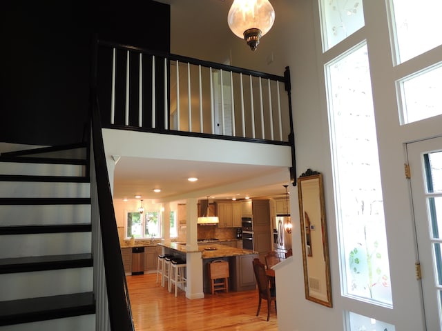13 Scotland Dr, Frankfort, KY 40601 - entrance foyer with a towering ceiling, stairs, light wood-style floors, and recessed lighting