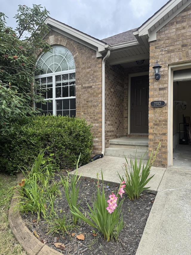 2312 Market Garden Ln, Lexington, KY 40509 - entrance to property with brick siding and a shingled roof