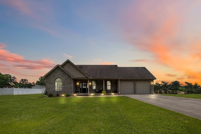 195 Couch Baker Ln, London, KY 40744 - ranch-style house featuring an attached garage, driveway, and brick siding
