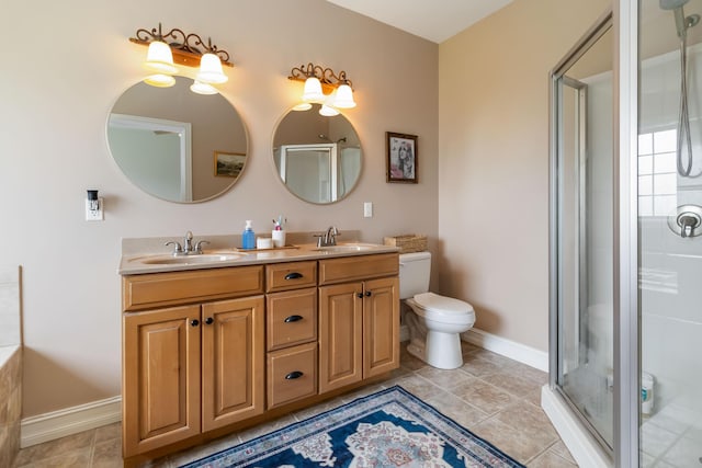 195 Couch Baker Ln, London, KY 40744 - full bathroom with double vanity, a shower stall, and tile patterned floors