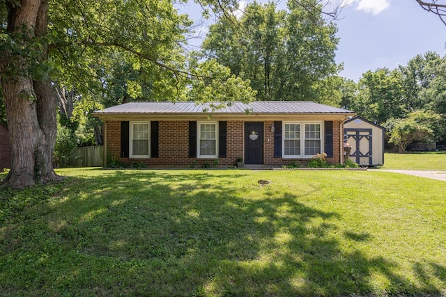 2314 Redbud Ln, Paris, KY 40361 - ranch-style house with a storage shed, brick siding, and a metal roof