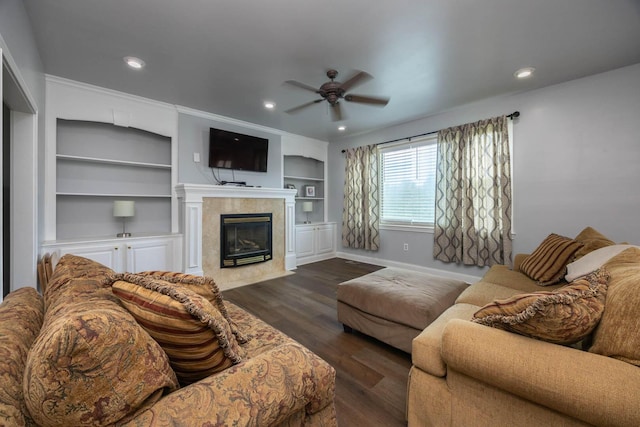 106 Squires Pointe Rd, Paris, KY 40361 - living room featuring a ceiling fan, dark wood-style floors, a tile fireplace, built in shelves, and recessed lighting