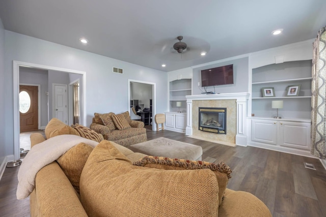 106 Squires Pointe Rd, Paris, KY 40361 - living area featuring a ceiling fan, dark wood finished floors, a premium fireplace, built in shelves, and recessed lighting