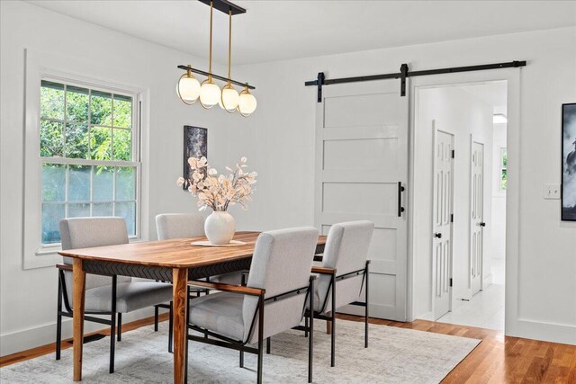 2940 Southview Dr, Lexington, KY 40503 - dining area with a barn door and light wood-type flooring