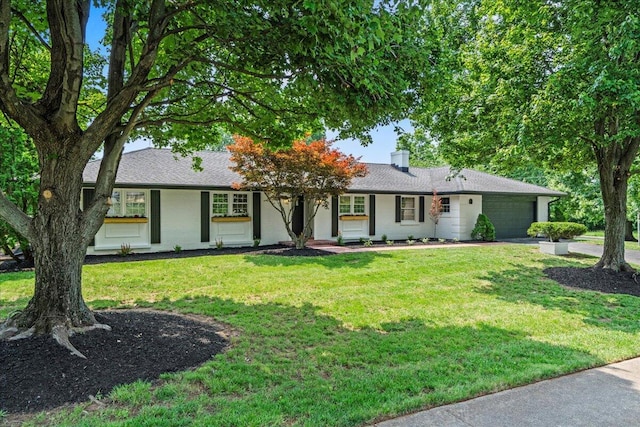 2940 Southview Dr, Lexington, KY 40503 - ranch-style home with a garage, a front lawn, concrete driveway, and a chimney
