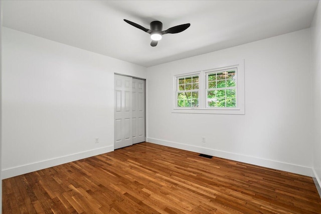 2940 Southview Dr, Lexington, KY 40503 - unfurnished bedroom featuring wood finished floors, a closet, and ceiling fan