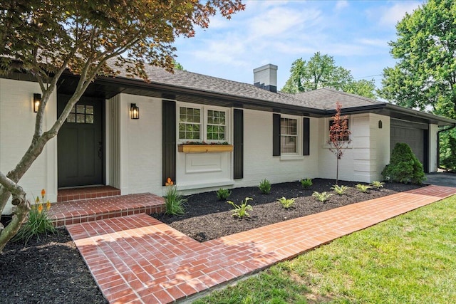 2940 Southview Dr, Lexington, KY 40503 - ranch-style home with a garage, a chimney, and brick siding