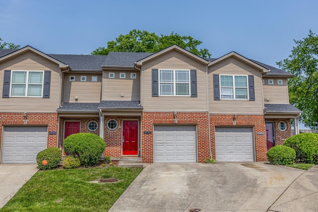 3123 Daly Pl, Lexington, KY 40511 - multi unit property with driveway, a garage, brick siding, and roof with shingles