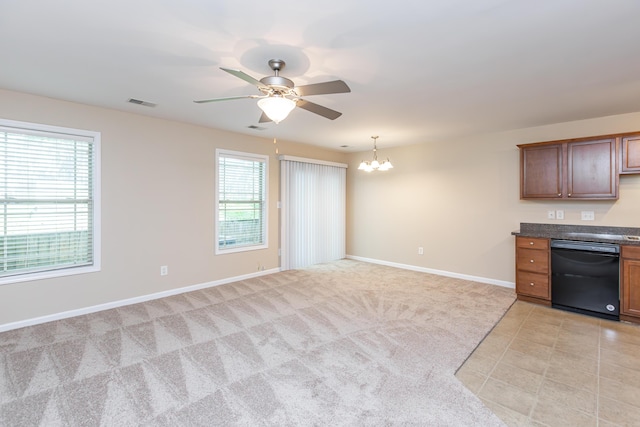 3123 Daly Pl, Lexington, KY 40511 - kitchen featuring black dishwasher, a chandelier, dark countertops, a ceiling fan, and light colored carpet