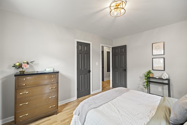 110 Flinn Ct, Georgetown, KY 40324 - bedroom with light wood-type flooring and baseboards