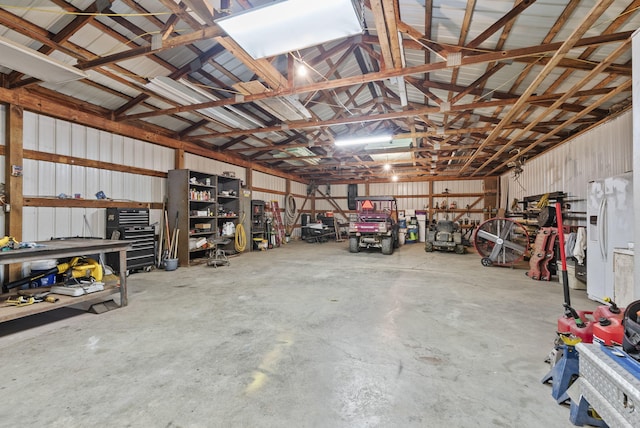 1651 Waits Rd, Cynthiana, KY 41031 - garage with a workshop area, white refrigerator with ice dispenser, and metal wall