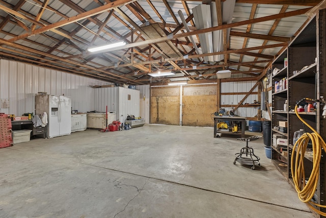 1651 Waits Rd, Cynthiana, KY 41031 - garage featuring white refrigerator with ice dispenser and a workshop area