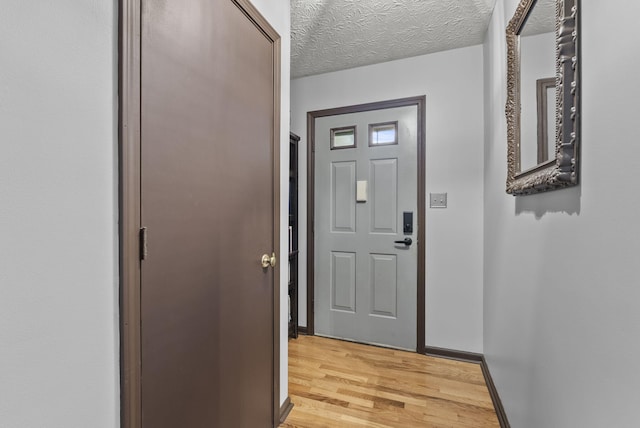 1651 Waits Rd, Cynthiana, KY 41031 - doorway to outside with light wood-style floors and a textured ceiling