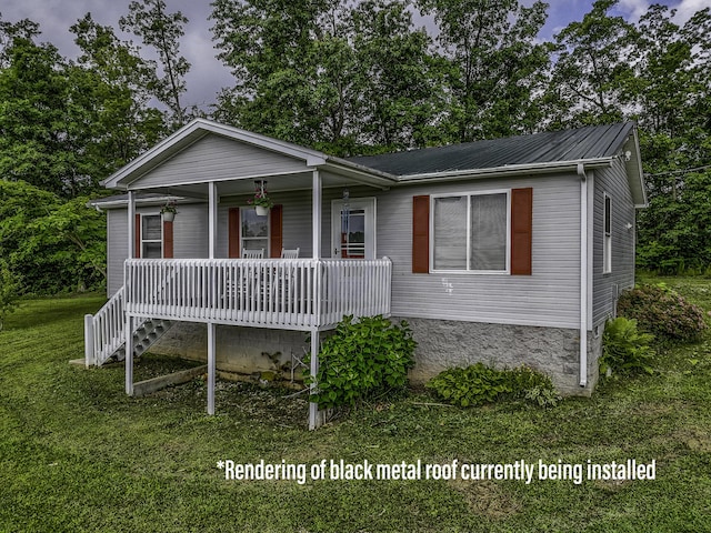 242 Possum Ridge Rd, West Liberty, KY 41472 - ranch-style house with covered porch, a front yard, and a metal roof