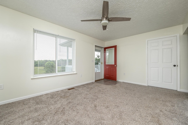 242 Possum Ridge Rd, West Liberty, KY 41472 - entryway with carpet floors, ceiling fan, and a textured ceiling