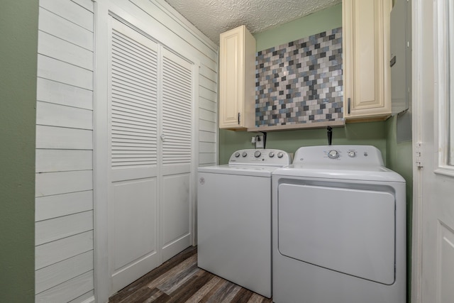 242 Possum Ridge Rd, West Liberty, KY 41472 - laundry area featuring cabinet space, washer and clothes dryer, dark wood finished floors, and a textured ceiling