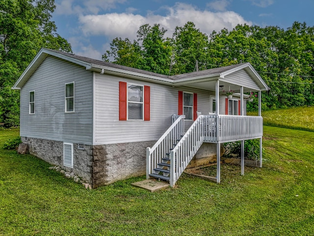 242 Possum Ridge Rd, West Liberty, KY 41472 - ranch-style home featuring a porch and a front yard