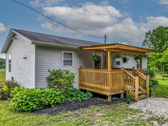 242 Possum Ridge Rd, West Liberty, KY 41472 - back of property with a wooden deck