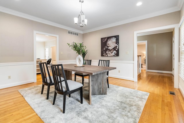 4991 Tynebrae Rd, Lexington, KY 40515 - dining area with light wood-type flooring, a chandelier, ornamental molding, and recessed lighting