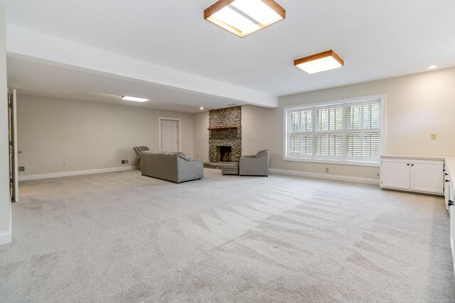 4991 Tynebrae Rd, Lexington, KY 40515 - living area featuring light colored carpet, a stone fireplace, and recessed lighting