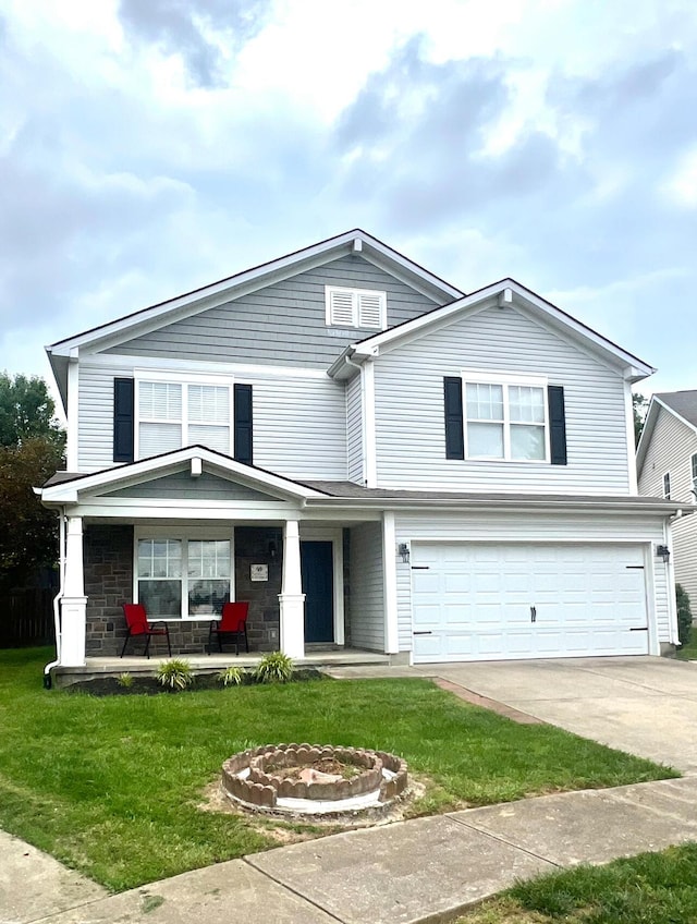 2368 Lonan Ct, Lexington, KY 40511 - view of front of property featuring a garage, a porch, a front lawn, and concrete driveway
