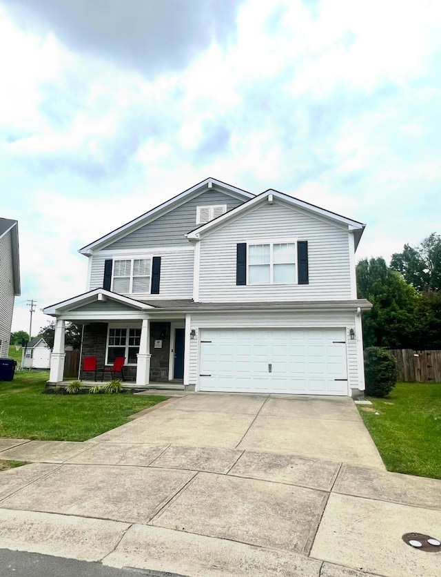 2368 Lonan Ct, Lexington, KY 40511 - view of front facade featuring covered porch, a garage, and concrete driveway