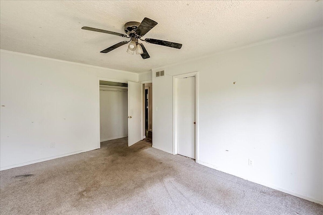 16 Meadowbrook Dr, Frankfort, KY 40601 - unfurnished bedroom with carpet flooring, a ceiling fan, and a textured ceiling