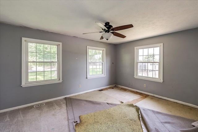 16 Meadowbrook Dr, Frankfort, KY 40601 - carpeted empty room featuring plenty of natural light and ceiling fan
