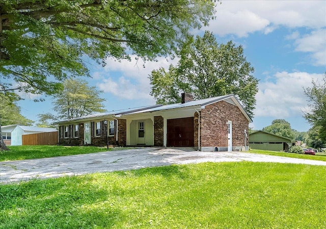 16 Meadowbrook Dr, Frankfort, KY 40601 - ranch-style home featuring driveway, an attached garage, a chimney, and brick siding