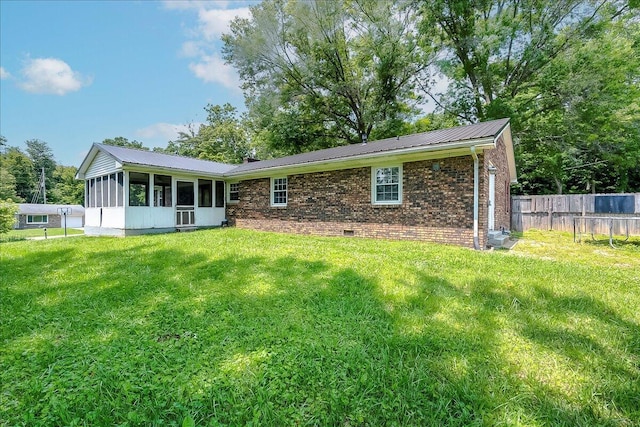 16 Meadowbrook Dr, Frankfort, KY 40601 - rear view of house featuring a sunroom, crawl space, brick siding, and a metal roof