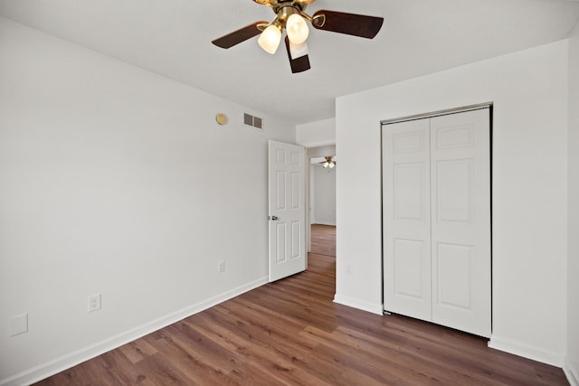 720 Pinoak Dr, Nicholasville, KY 40356 - unfurnished bedroom with wood finished floors, a closet, and ceiling fan