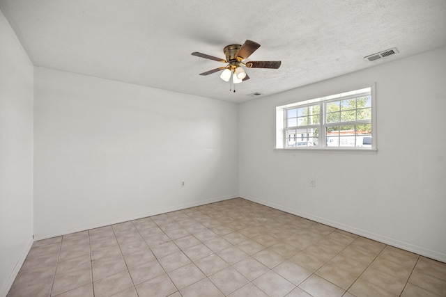 720 Pinoak Dr, Nicholasville, KY 40356 - empty room featuring a ceiling fan and a textured ceiling