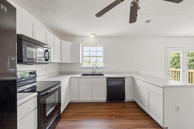 720 Pinoak Dr, Nicholasville, KY 40356 - kitchen featuring black appliances, a textured ceiling, a peninsula, a ceiling fan, and dark wood finished floors