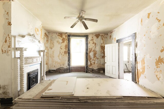 411 High St, Paris, KY 40361 - unfurnished living room featuring ceiling fan, plenty of natural light, a fireplace, and wallpapered walls