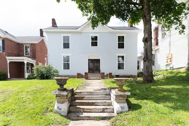 411 High St, Paris, KY 40361 - view of front of home with a chimney, a front yard, and french doors