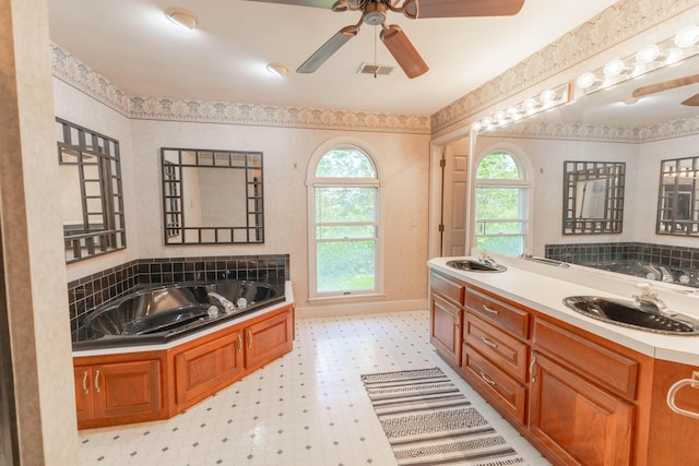 6011 Canonero Way, Versailles, KY 40383 - bathroom with tile patterned floors, a ceiling fan, a bath, and vanity