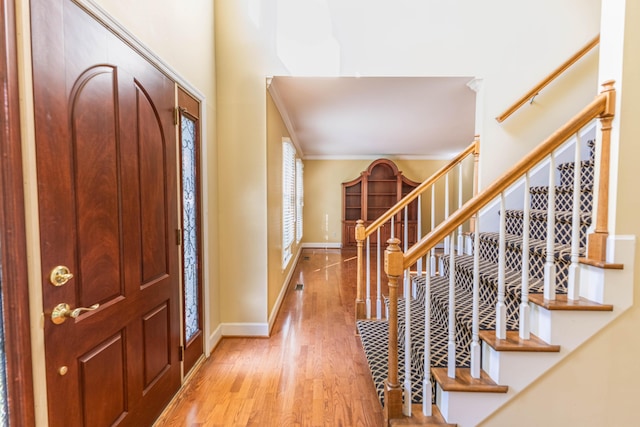 6011 Canonero Way, Versailles, KY 40383 - foyer with wood finished floors, stairs, and ornamental molding