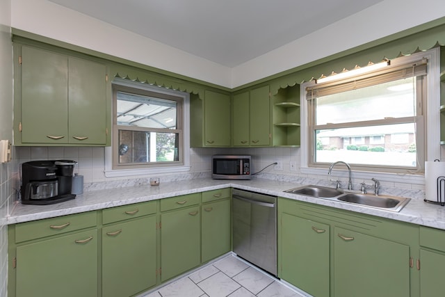 111 Hagan Ct, Lancaster, KY 40444 - kitchen with stainless steel appliances, decorative backsplash, light countertops, and plenty of natural light